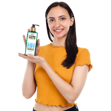 tea ease shampoo hold by a woman tea ease shampoo hold by a woman