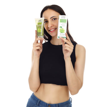 2 green apple scrub holding by a woman 2 green apple scrub holding by a woman