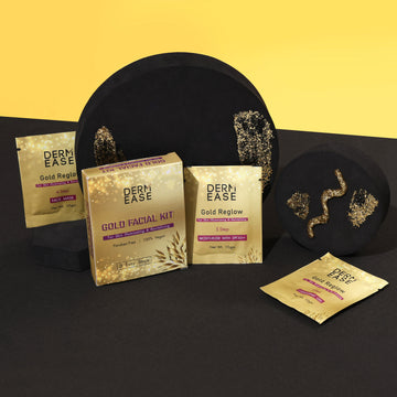 Derm Ease Gold Facial Kit with gold packets on a black tray against a yellow background Derm Ease Gold Facial Kit with gold packets on a black tray against a yellow background