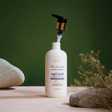 Body wash bottle with pump on a natural setting Body wash bottle with pump on a natural setting