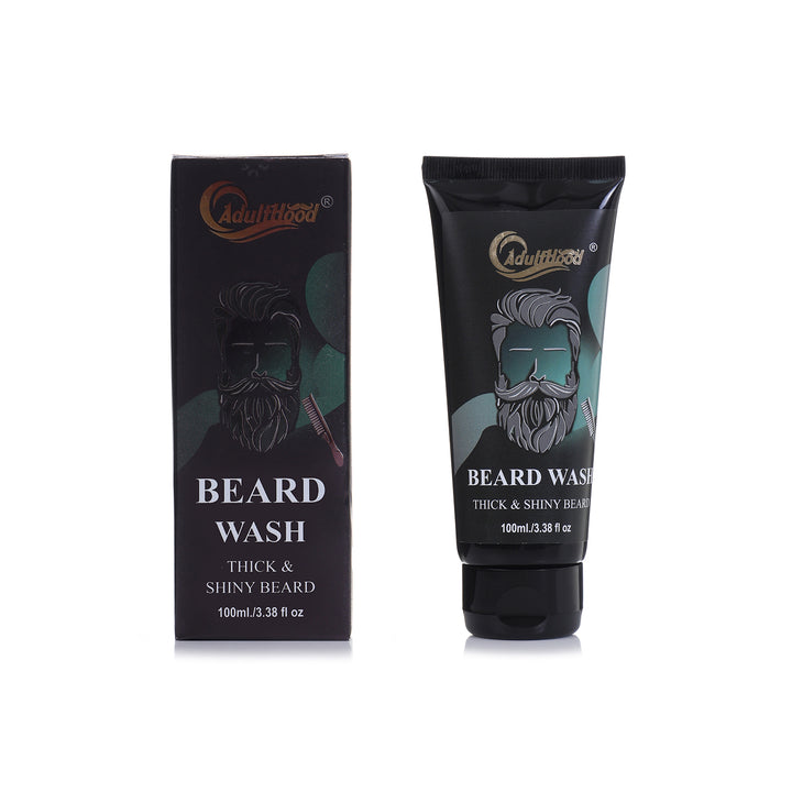 Beard wash packaging with black tube and box on a white background